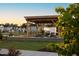 Relaxing community space with firepit, pergola, and seating at 120 Kobus Ct, Garner, NC 27529