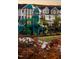 Community playground with playset and surrounding landscaping at 120 Kobus Ct, Garner, NC 27529