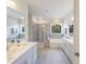 Luxurious bathroom with soaking tub and double vanity at 1212 Coral Cay Bnd, Wake Forest, NC 27587