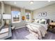 Spacious bedroom with large windows and neutral decor at 1212 Coral Cay Bnd, Wake Forest, NC 27587