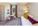 Cozy bedroom with a daybed and window seat at 1212 Coral Cay Bnd, Wake Forest, NC 27587