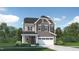 Two-story house with gray siding, white garage door, and stone accents at 1212 Coral Cay Bnd, Wake Forest, NC 27587
