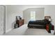 Neutral bedroom with dark furniture, light carpet, and great natural light at 1610 Woodards Dairy Rd, Middlesex, NC 27557