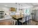 Modern kitchen with large island and stainless steel appliances at 1610 Woodards Dairy Rd, Middlesex, NC 27557