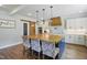 Modern kitchen with a large island and farmhouse sink at 1610 Woodards Dairy Rd, Middlesex, NC 27557