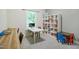 Home office with two desks and built-in shelving at 1610 Woodards Dairy Rd, Middlesex, NC 27557