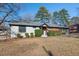 Ranch style home with landscaped yard at 1801 Liberty St, Durham, NC 27703