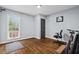 Home office with hardwood floors and large window at 1801 Liberty St, Durham, NC 27703
