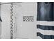 Shower with black and white striped curtain at 1801 Liberty St, Durham, NC 27703