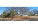 Empty lot located on a corner lot with mature trees at 1801 Liberty St, Durham, NC 27703