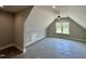 Bonus room under construction with ceiling fan and a window at 190 Broadleaf Ln, Louisburg, NC 27549