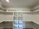 Large walk-in closet with custom shelving and ample storage space at 190 Broadleaf Ln, Louisburg, NC 27549