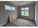 Dining room with a view to backyard and modern light fixture at 190 Broadleaf Ln, Louisburg, NC 27549