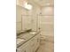 Clean bathroom featuring double sink vanity with granite countertop and shower at 24 Surles Landing Way, Benson, NC 27504