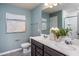 Bathroom with double vanity, large mirror, and shower at 2907 Huxley Way, Apex, NC 27502