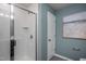 Modern bathroom with a shower and glass enclosure at 2907 Huxley Way, Apex, NC 27502