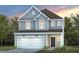 Two-story house with gray siding, white garage door, and landscaping at 2907 Huxley Way, Apex, NC 27502