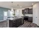 Modern kitchen with stainless steel appliances and granite countertops at 2907 Huxley Way, Apex, NC 27502
