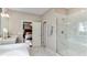 Spa-like bathroom with walk-in shower, marble flooring, and modern fixtures at 2948 Hanging Valley Way, Wake Forest, NC 27587
