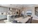 Modern kitchen with gray cabinets, white countertops, and a large island at 2948 Hanging Valley Way, Wake Forest, NC 27587