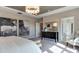 Main bedroom with plush carpet, large windows, and plenty of closet space at 2948 Hanging Valley Way, Wake Forest, NC 27587