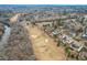 Gorgeous aerial view of a golf course community with stunning homes and lush greenery at 306 Neuse Ridge Dr, Clayton, NC 27527
