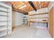 Unfinished basement featuring open ceiling with exposed plumbing and brick foundation at 306 Neuse Ridge Dr, Clayton, NC 27527