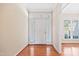 Inviting foyer with hardwood floors, leading into the home's interior and showcasing a bright, welcoming entrance at 306 Neuse Ridge Dr, Clayton, NC 27527