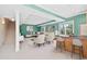 Entertainment room including a bar area and an open Gathering area with a large sofa at 306 Neuse Ridge Dr, Clayton, NC 27527