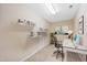 Home office with a modern desk, shelving, and neutral tones for a productive workspace at 306 Neuse Ridge Dr, Clayton, NC 27527