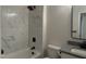 Modern bathroom featuring white tile and black fixtures at 415 Sowell St, Durham, NC 27701