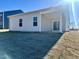 House exterior showcasing a covered patio and siding at 456 Glover Park Memorial Drive, Nashville, NC 27856
