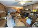 Large basement area with brick fireplace and numerous items at 515 Docs Rd, Lillington, NC 27546