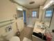 Bathroom with double vanity, walk-in shower, and toilet at 515 Docs Rd, Lillington, NC 27546