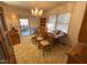 Bright dining room with a table, chairs, and access to a patio at 515 Docs Rd, Lillington, NC 27546