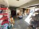Attached garage with ample storage space and shelving at 515 Docs Rd, Lillington, NC 27546