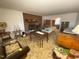 Spacious living room with brick fireplace and large windows at 515 Docs Rd, Lillington, NC 27546