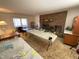 Living area featuring a brick fireplace at 515 Docs Rd, Lillington, NC 27546