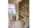 Walk-in pantry with shelves stocked with glassware at 515 Docs Rd, Lillington, NC 27546