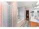 Bright bathroom featuring a soaking tub, double sink vanity, and a separate shower area at 575 Crystal Spring Dr, Sanford, NC 27332