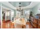 Bright dining room with hardwood floors and lots of natural light from two large windows at 575 Crystal Spring Dr, Sanford, NC 27332