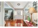 Bright foyer featuring hardwood floors, a Christmas tree, and an entryway with ample natural light at 575 Crystal Spring Dr, Sanford, NC 27332