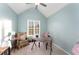 Bright office space with a desk, chair, and neutral decor for a calming work environment at 575 Crystal Spring Dr, Sanford, NC 27332