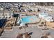 Aerial view of community pool, playground, and parking at 5940 Illuminate Ave, Raleigh, NC 27616