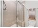 Shower with glass enclosure and built-in bench at 5940 Illuminate Ave, Raleigh, NC 27616