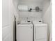 Laundry room with washer, dryer, and shelving at 5940 Illuminate Ave, Raleigh, NC 27616