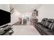 Open concept living room with view of kitchen and island at 5940 Illuminate Ave, Raleigh, NC 27616