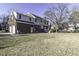 Expansive backyard featuring a well-maintained lawn and mature trees at 805 Joshua Clay Dr, Rocky Mount, NC 27803