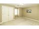 Bedroom with closet, carpeted floor, and natural light from a window at 805 Joshua Clay Dr, Rocky Mount, NC 27803