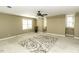 Bonus room features a ceiling fan, carpet flooring and natural light from windows at 805 Joshua Clay Dr, Rocky Mount, NC 27803